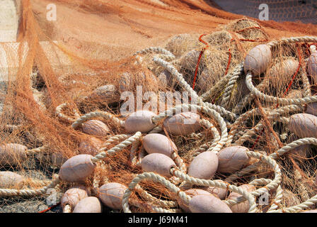 Angolo netto di pesce pescatore Tutina in rete rete da pesca colorata splendida colorato Foto Stock