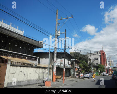 Questo indirizzo si riferisce ad una posizione a Caloocan City, Filippine, in particolare sulla 6th Avenue nella Sagrada Familia Barangay vicino a Grace Park e Mabini Street, evidenziando un'area chiave all'interno della città. Foto Stock