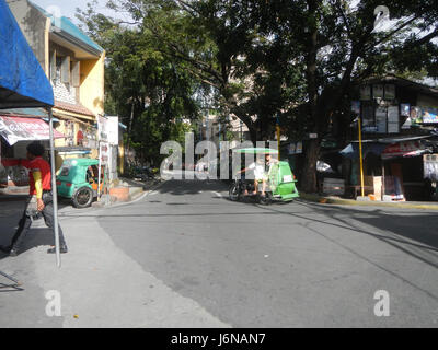 Questa voce si riferisce a vari barangay (quartieri) nella città di Mandaluyong, Filippine. Menziona strade e aree come Malamig, Barangka e Boni Avenue, significative per il governo locale e le infrastrutture della città. Foto Stock