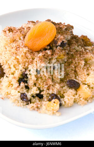 Uvetta sultanina frutta albicocche africana uva sultanina cinamon cannella cuscus cibo aliment Foto Stock