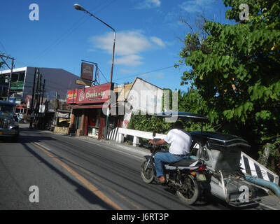 Questo titolo si riferisce a un indirizzo o una posizione sulla MacArthur Highway, Catmon, Malolos, nelle Filippine. Probabilmente descrive un punto o una strada specifici all'interno della regione vicino al Paseo del Congreso. La MacArthur Highway è un'importante strada nelle Filippine, che collega varie città. Foto Stock
