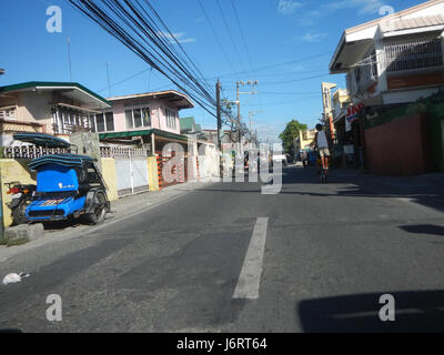Questo si riferisce a una località nelle Filippine, in particolare sulla MacArthur Highway nella città di Malolos, Bulacan. L'area include il Paseo del Congreso a Catmon, una strada o quartiere notevole della regione. Foto Stock