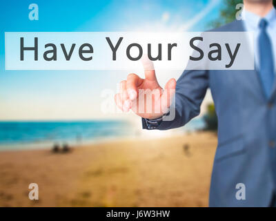 Dite la vostra - Imprenditore mano premendo il pulsante sul touch screen interfaccia. Business, tecnologia internet concetto. Stock Photo Foto Stock