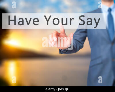 Dite la vostra - Imprenditore mano premendo il pulsante sul touch screen interfaccia. Business, tecnologia internet concetto. Stock Photo Foto Stock