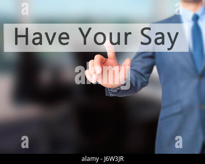 Dite la vostra - Imprenditore mano premendo il pulsante sul touch screen interfaccia. Business, tecnologia internet concetto. Stock Photo Foto Stock