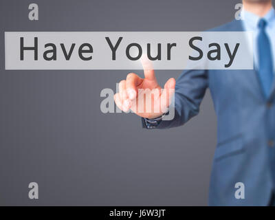 Dite la vostra - Imprenditore mano premendo il pulsante sul touch screen interfaccia. Business, tecnologia internet concetto. Stock Photo Foto Stock
