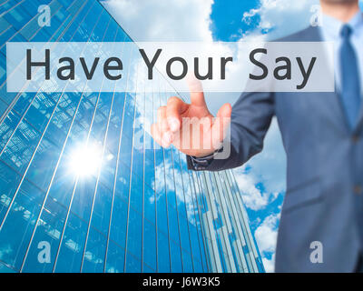 Dite la vostra - Imprenditore mano premendo il pulsante sul touch screen interfaccia. Business, tecnologia internet concetto. Stock Photo Foto Stock