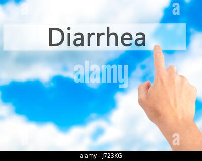 Diarrea - Mano premendo un pulsante sul fondo sfocato concetto . Business, tecnologia internet concetto. Stock Photo Foto Stock