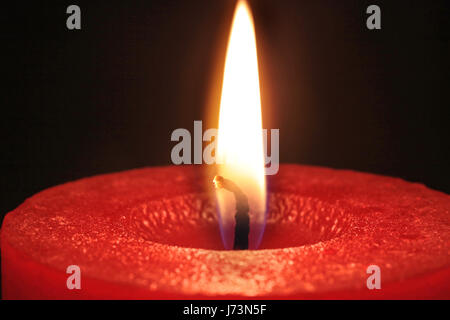 Red candela che brucia Foto Stock