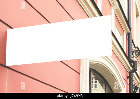 Blank mock up cartello sulla parete Foto Stock