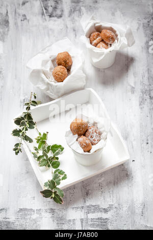 Ciambella fori ricoperti di zucchero vanigliato Foto Stock