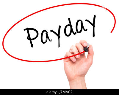 Man mano che scrive Payday con pennarello nero su schermo visivo. Isolato su bianco. Business, tecnologia internet concetto. Stock Photo Foto Stock