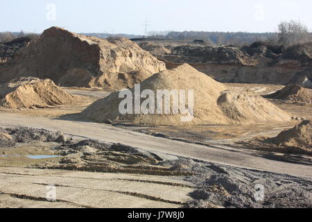 Materiale da costruzione sandhill sabbia postulato rivendicazione sands sabbia costruire senso Foto Stock