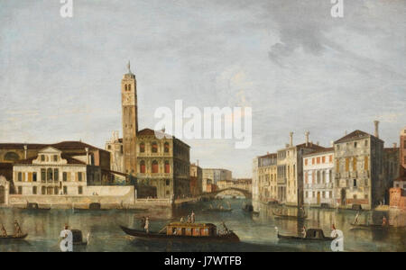 Questo dipinto di Apollonio Domenichini presenta una vista panoramica di Venezia, concentrandosi sul Canal grande, la Chiesa di San Geremia e l'ingresso al quartiere Cannaregio. Le opere d'arte catturano i famosi corsi d'acqua di Venezia, la bellezza architettonica e l'atmosfera unica della città nel XVIII secolo. Foto Stock