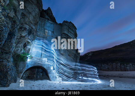 La pittura di luce sulla spiaggia porthcurno - porthcurno, Cornwall, Regno Unito Foto Stock