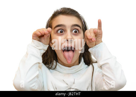 Ritratto di giovane bambina con un grimace di derisione Foto Stock