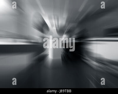 Interno di un centro commerciale per lo shopping. shot prese con motion blur effetto. Foto Stock