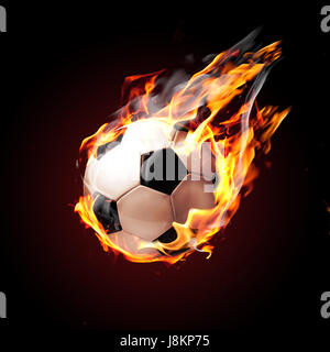 Pallone da calcio sul fuoco Foto Stock