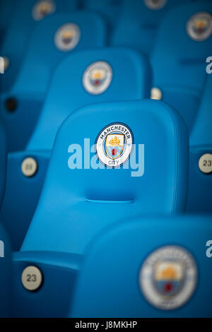 Manchester City Etihad Stadium posh sedili con logo rotondo. Foto Stock