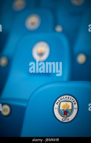 Manchester City Etihad Stadium posh sedili con logo rotondo. Foto Stock