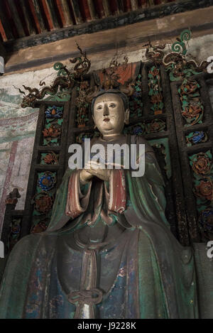 La madre e il bambino scultura, sala della dea della fertilità, Tempio di Shuanglin, un grande tempio buddista della dinastia Ming, Pingyao, nella provincia di Shanxi, Foto Stock