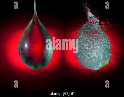 Palloncino, esplodere, velocità, velocità, esplosione, burst, rosso, acqua, movimento Foto Stock