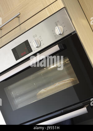 Fornello e forno di cottura in cucina Foto Stock