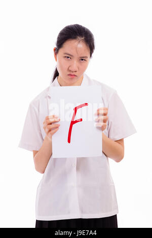 Chinese high school girl in uniforme che mostra impossibile testare la carta Foto Stock