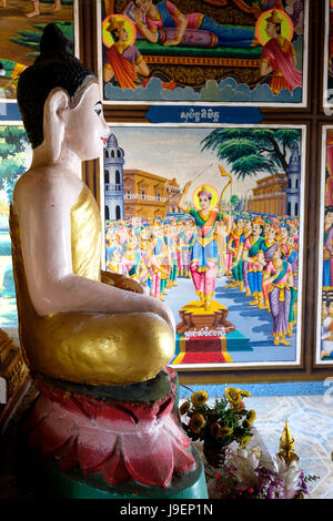 Buddha seduto su un fiore di loto e dipinti murales raffiguranti scene della vita del Buddha, Phnom Sambok tempio, Kratie, Cambogia, Sud-Est asiatico Foto Stock