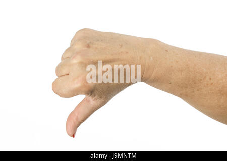 Donna pollice giù isolati su sfondo bianco. Dito femmina giù gesto. Foto Stock