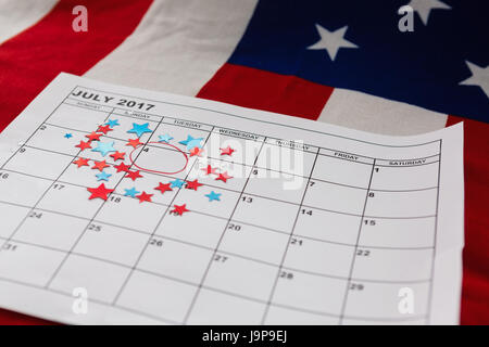 Calendario contrassegnati con forma a stella decorazione con il 4 ° luglio tema Foto Stock