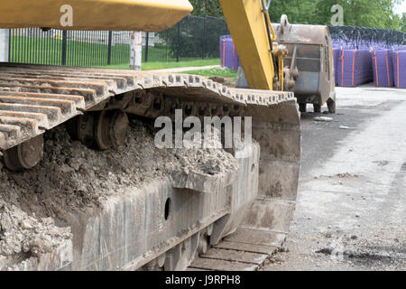 Costruzione di vie escavatore Foto Stock