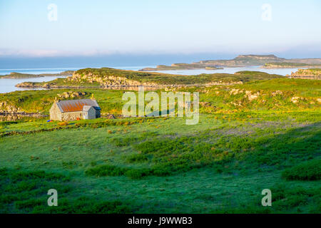 Bothy (cottage) sull'isola di Ulva, Mull, Scozia Foto Stock