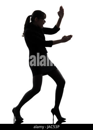 Un business donna karate Self Defence silhouette studio isolato su sfondo bianco Foto Stock