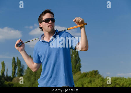 Juge Männer spielen Golf Foto Stock