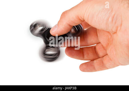 Palying con un nero agitano: Spinner isolati su sfondo bianco Foto Stock