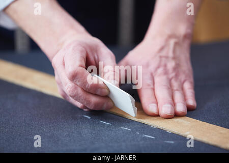 Sarti mani tessuto di marcatura Foto Stock