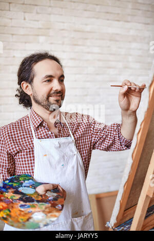 Ispirato artista pittura immagine in Art-Studio Foto Stock