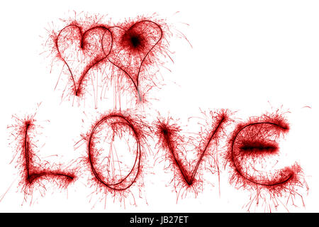 Red parola di amore e di due cuori da sparkler isolati su sfondo bianco Foto Stock