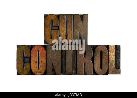 Le parole di controllo pistola scritto in vintage tipo di stampa in rilievo Foto Stock