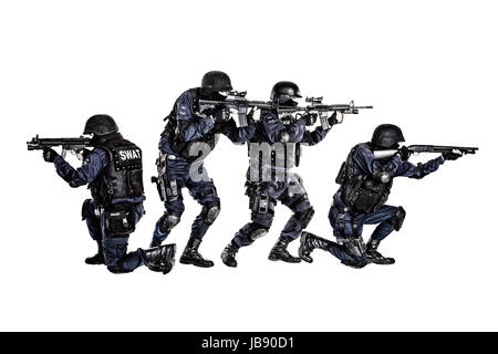 Armi speciali e operazioni tattiche (SWAT) il team in azione Foto Stock