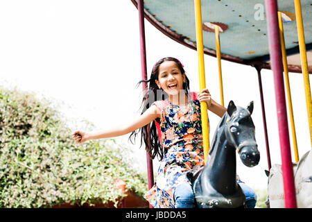 1 indian bambina fair cavallo divertimento allegro Foto Stock