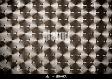 Sullo sfondo di un metallo con ripetitivo patten Foto Stock