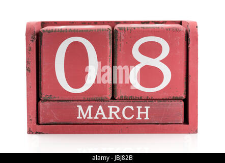 In legno rosso Calendario Marzo 8. Isolare il bianco. Foto Stock