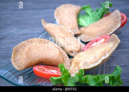 Una sana gnocchi di patate con formaggio dalla farina integrale. Foto Stock