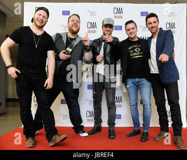 London, Canada. 11 Giugno, 2017. London, Ontario. 11 giugno 2017. 2017 CMA Ontario (Country Music Association Ontario) la premiazione. Nella foto, Cherry Bomb. Credito: EXImages/Alamy Live News Foto Stock