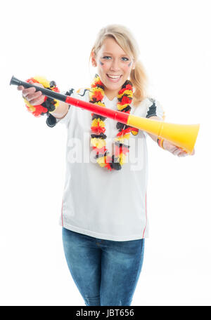 Blonde appassionato di calcio con vuvuzela Foto Stock