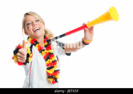 Blonde appassionato di calcio con vuvuzela Foto Stock