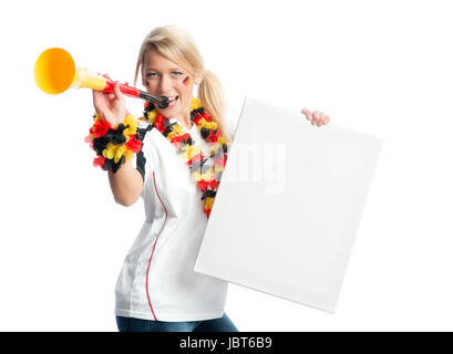 Blonde appassionato di calcio con vuvuzela tenendo un poster Foto Stock