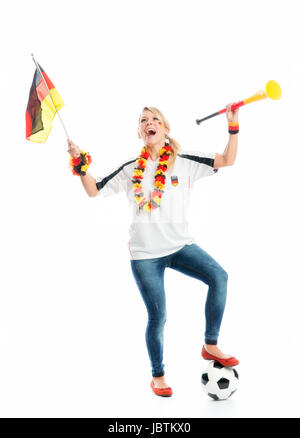 Blonde appassionato di calcio con vuvuzela Foto Stock